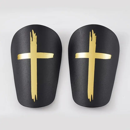 MIni shin pads with God's Cross